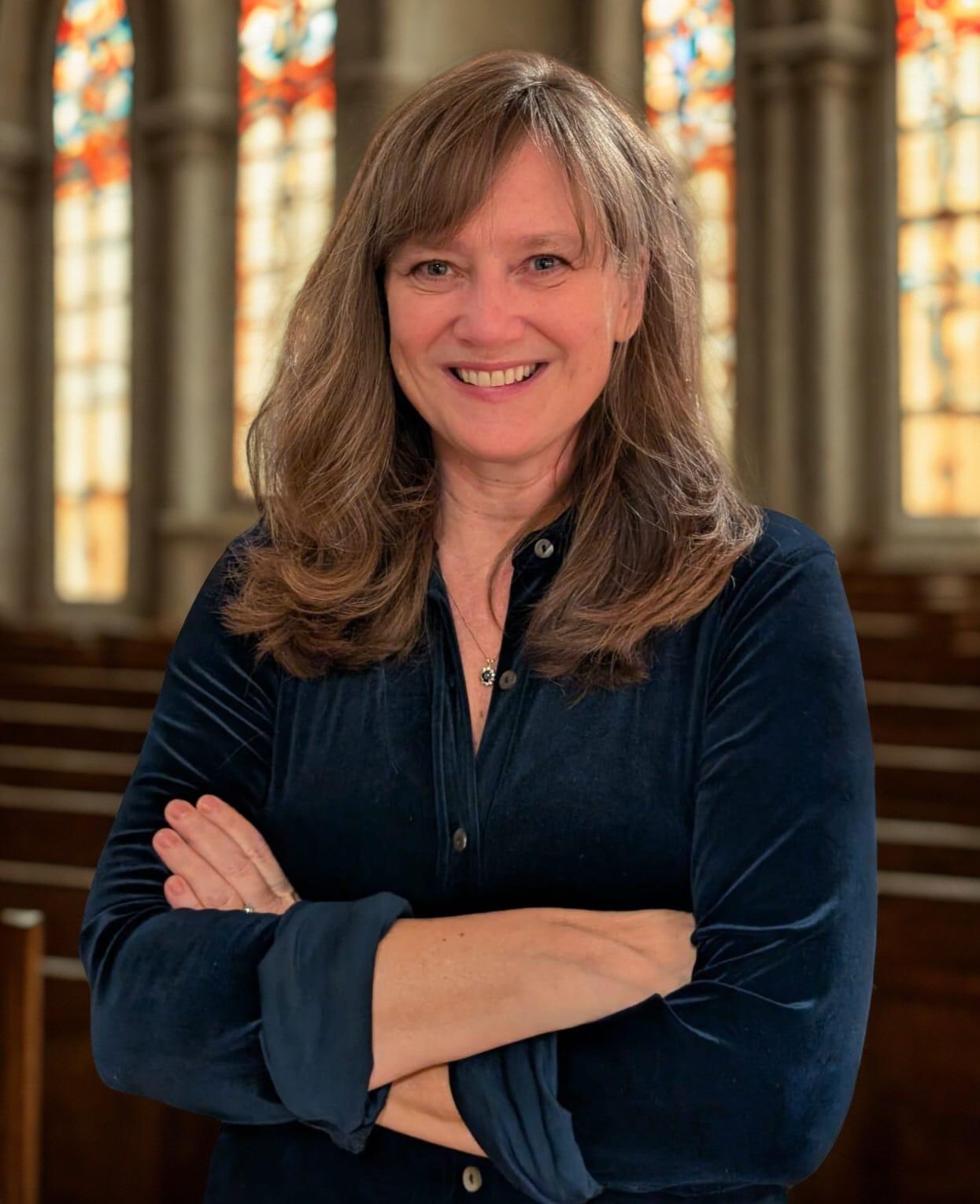 Jennifer Henry profile pic standing in a church