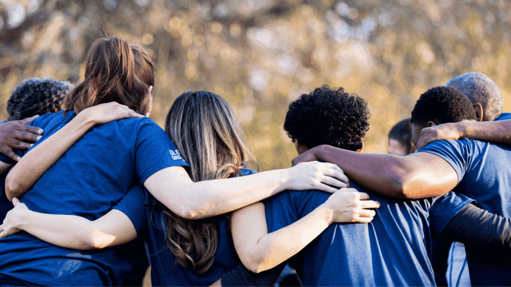 Group of friends with arms around each other